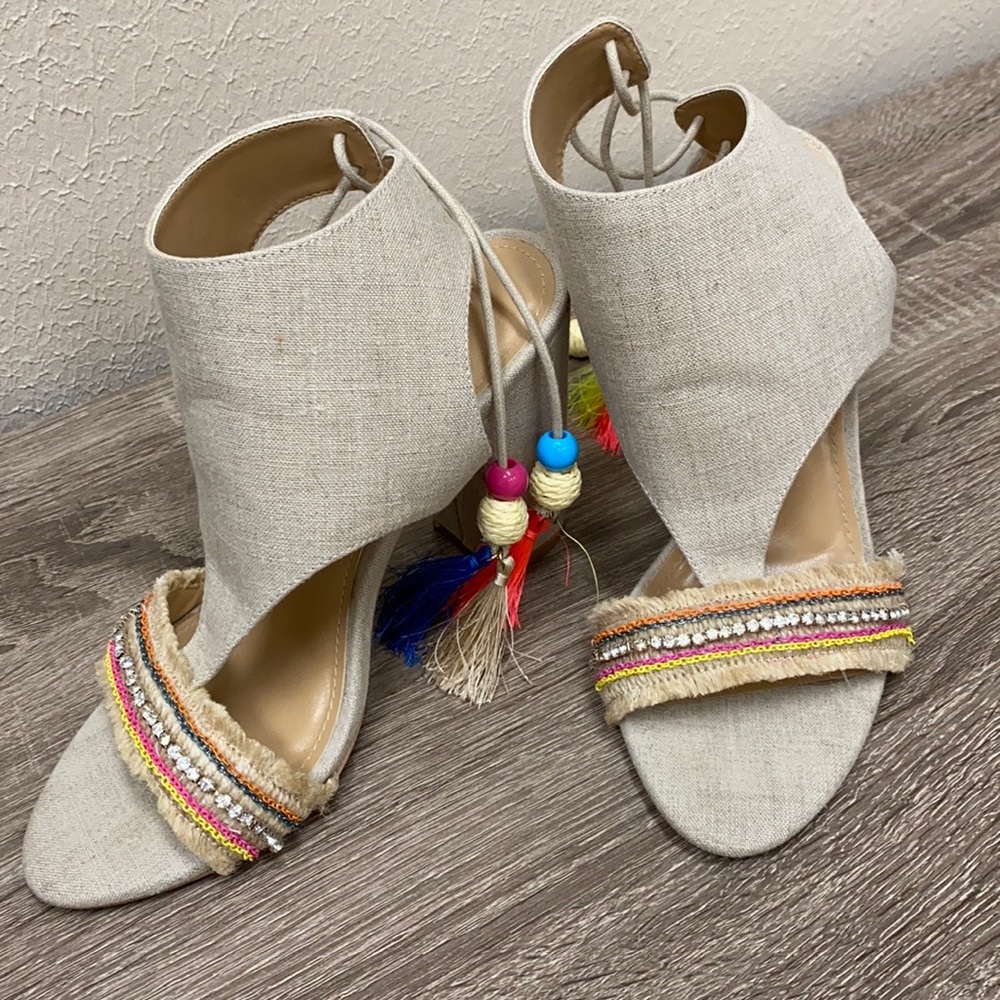 Express tassel block heels